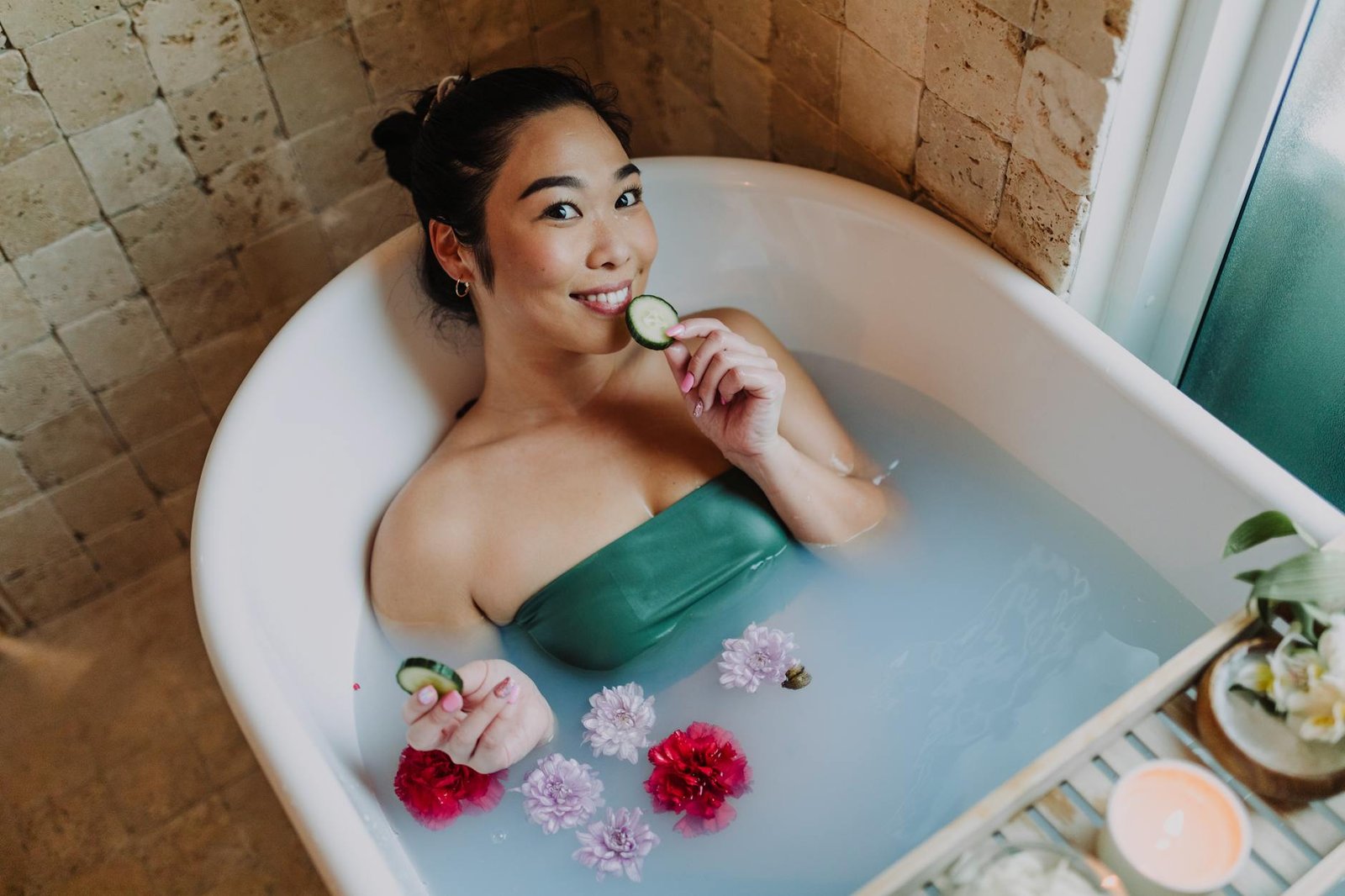 woman pampering herself in bathtub